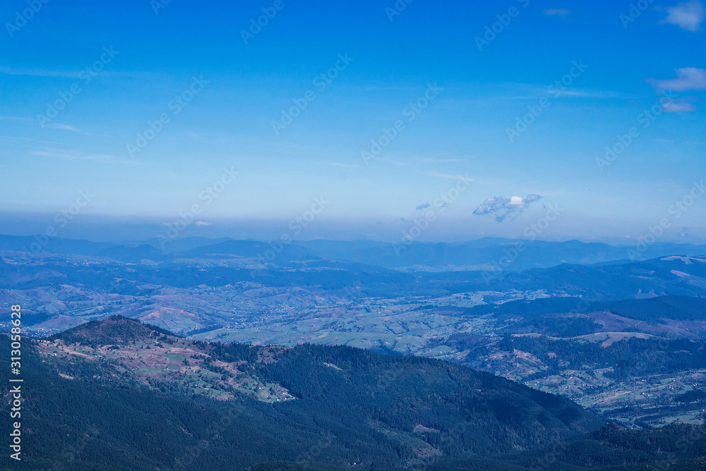 Mountain clean landscape for the background of the website landing page or booklet. Rocks and hills far in the horizon. Colored sky. Mountain clean landscape for the background of the website landing page or booklet. Rocks and hills far in the horizon. Colored sky.