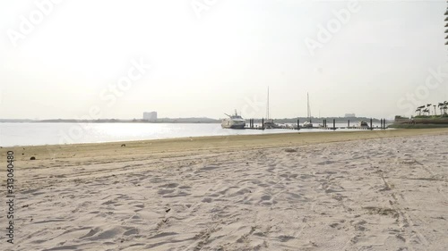 Jejak Bergelombang Di Pasir Pantai - Slide Left To Right  photo