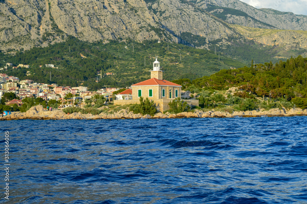  Lighthouse on Makarska riviera beach in Makarska, Croatia on June 17, 2019.