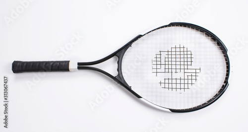 Single tennis racket isolated white background. Top view