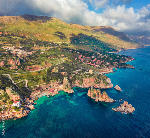 View from flying drone. Splendid spring scene of Tonnara di Scopello. Incredible landscape of Sicily, Italy, Europe. Spectacular morning seascape of Mediterranean sea. Traveling concept background..