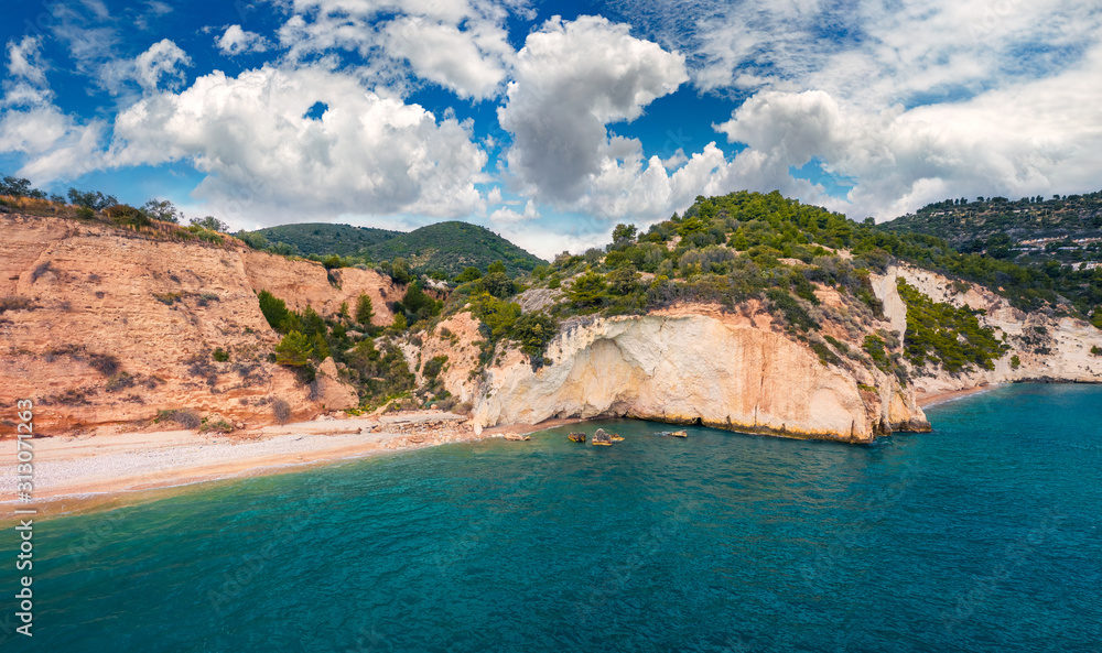 View from flying drone. Picturesque summer view of popular tourist destination - Mattinatella beach (Fontana delle Rose). Exciting seascape of Adriatic seascape, Gargano National Park, Italy, Europe. View from flying drone. Picturesque summer view of popular tourist destination - Mattinatella beach (Fontana delle Rose). Exciting seascape of Adriatic seascape, Gargano National Park, Italy, Europe.
