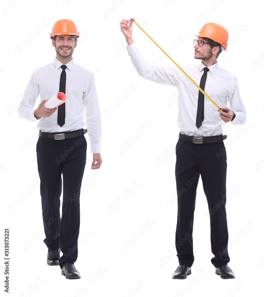 in full growth .smiling architect in orange helmet. in full growth .smiling architect in orange helmet.