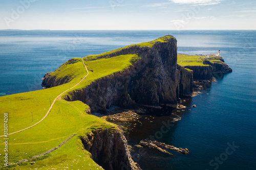 Neist Point Lighthouse with Blue Skies photo