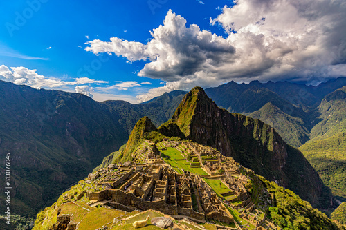 Peru, Eastern Cordillera, Cusco region. Historic Sanctuary of Machu Picchu seen from House of Guards. There is Huayna Picchu raised above the Inca city