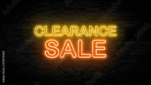 Clearance sale letter on the black brick wall for promotion sale and for clearance sale and for promote sale season. photo