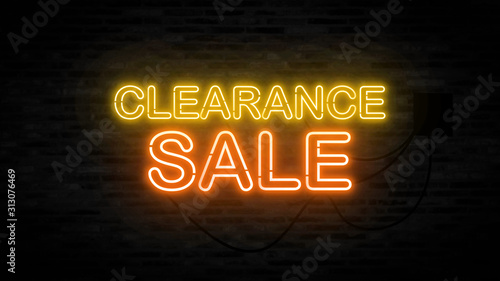 Clearance sale letter on the black brick wall for promotion sale and for clearance sale and for promote sale season.