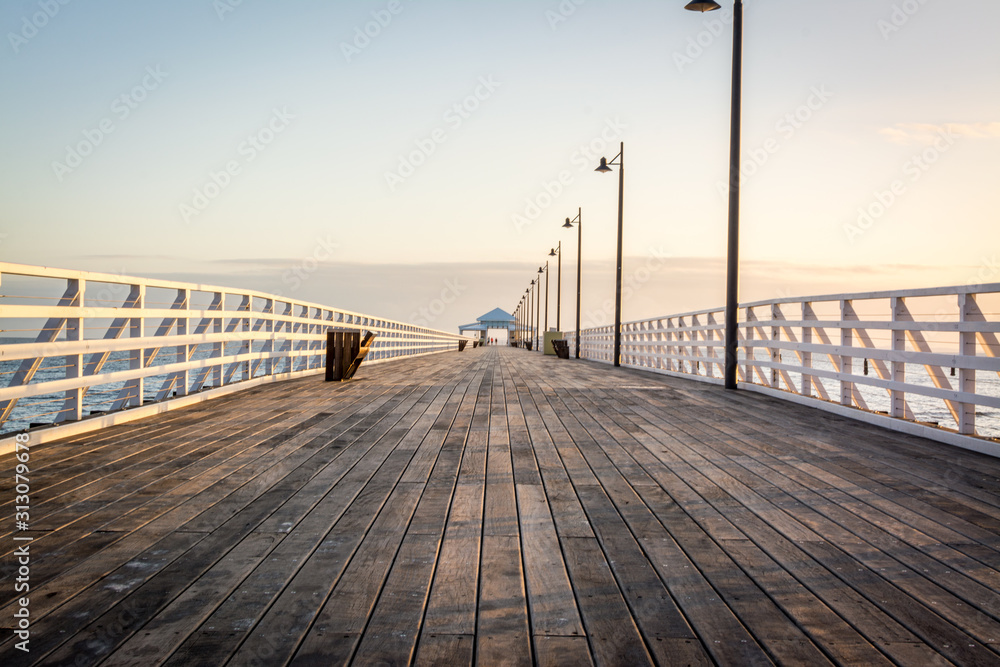 wooden pier at sunset 