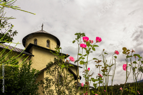 The Library, courtyard, the belfry and the church of  Assumption of Mary in Serbian Orthodox monastery (cloister) Moracha in Montenegro, founded in 1252,  Rascian architectural style, frescoes photo