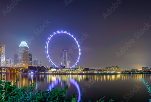 Singapore Flyer - Aug 2019 - Light up on Singapore Flyer view look from the marina at blue hour