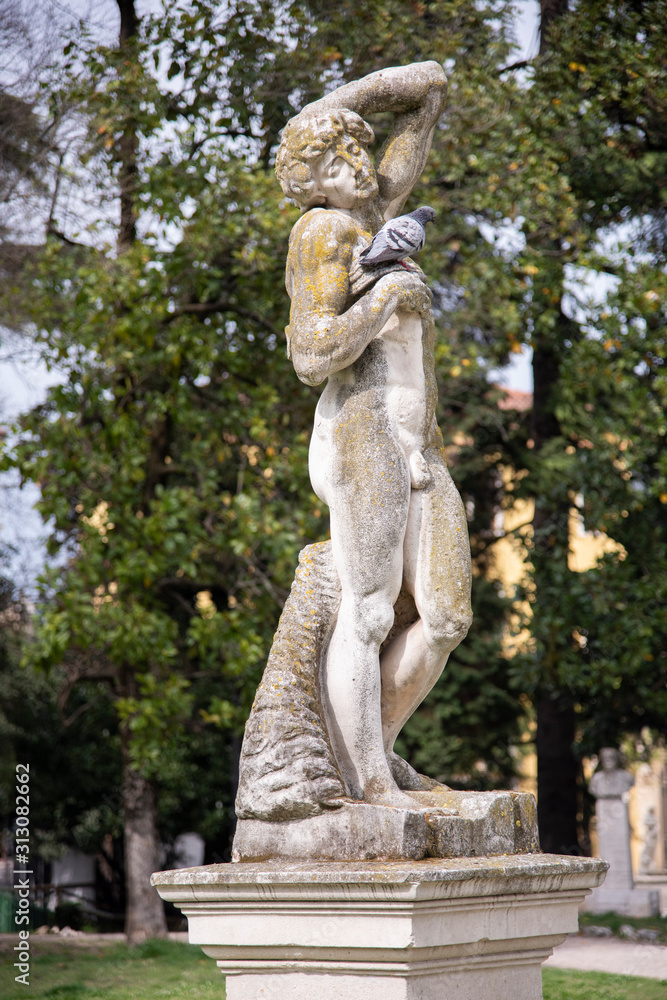 White marble statue in the Salvi public gardens, Vicenza, Italy, reproductions of a classic theme