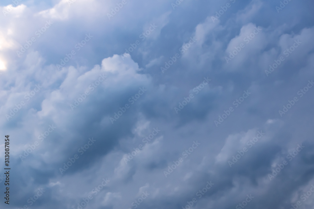 gray Cumulus clouds in a blue sky gray Cumulus clouds in a blue sky