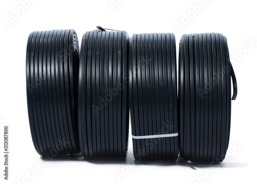 Coils of black cable isolated on white background