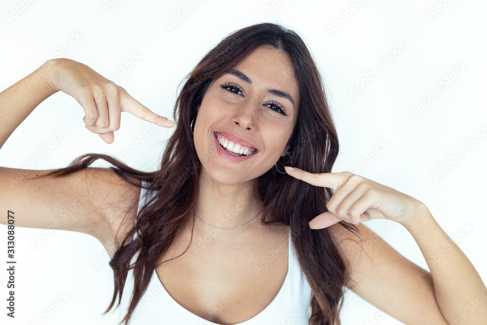 Pretty young woman with perfect smile looking at camera. Isolated on white. Pretty young woman with perfect smile looking at camera. Isolated on white.