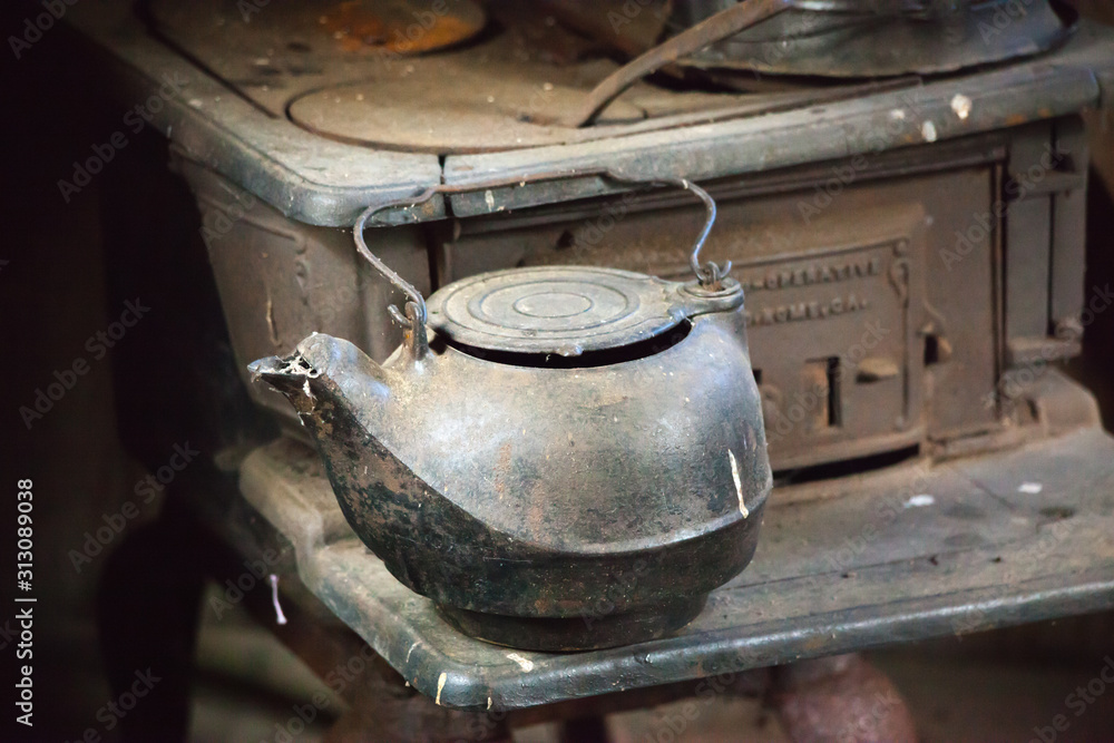 Old Cast Iron Kettle for a wood burning stove Old Cast Iron Kettle for a wood burning stove