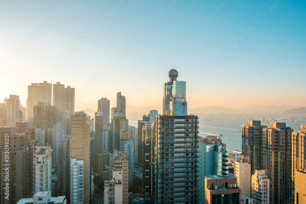 Hong Kong city skyline , skyscraper and blue sky copy space -