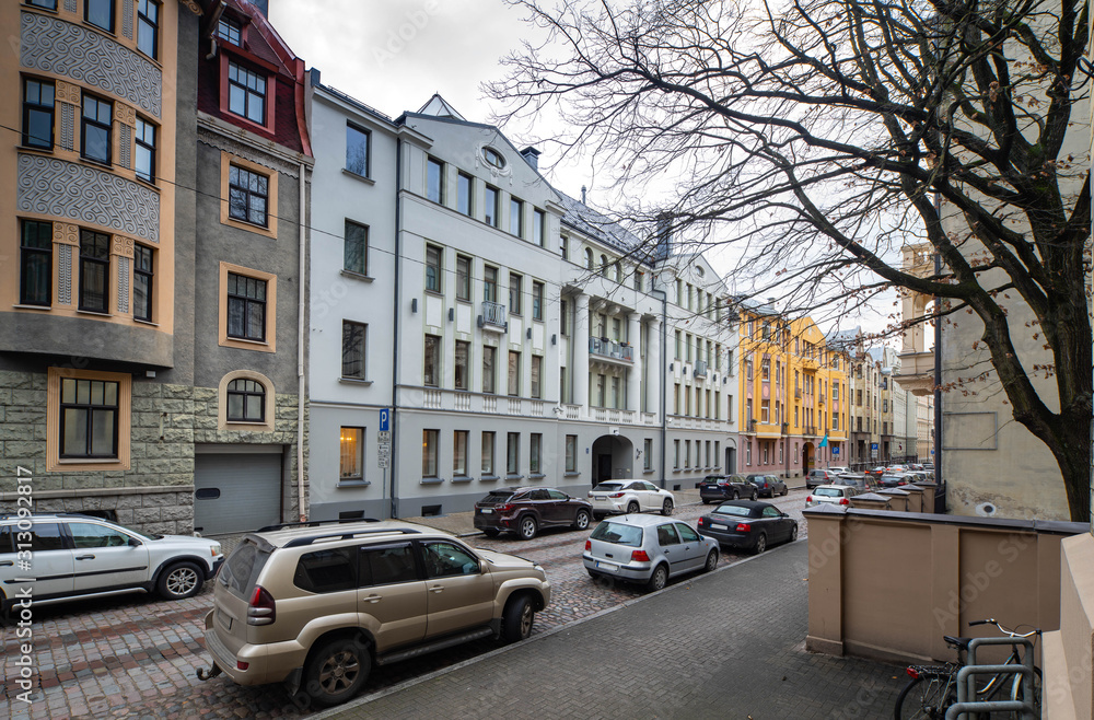 Modern buildings on the city street. Riga, Latvia. Car parking. Art Nouveau architecture.