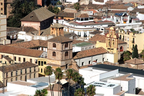 Elevated view of St Augustine church seen from the castle, Malaga, Spain.