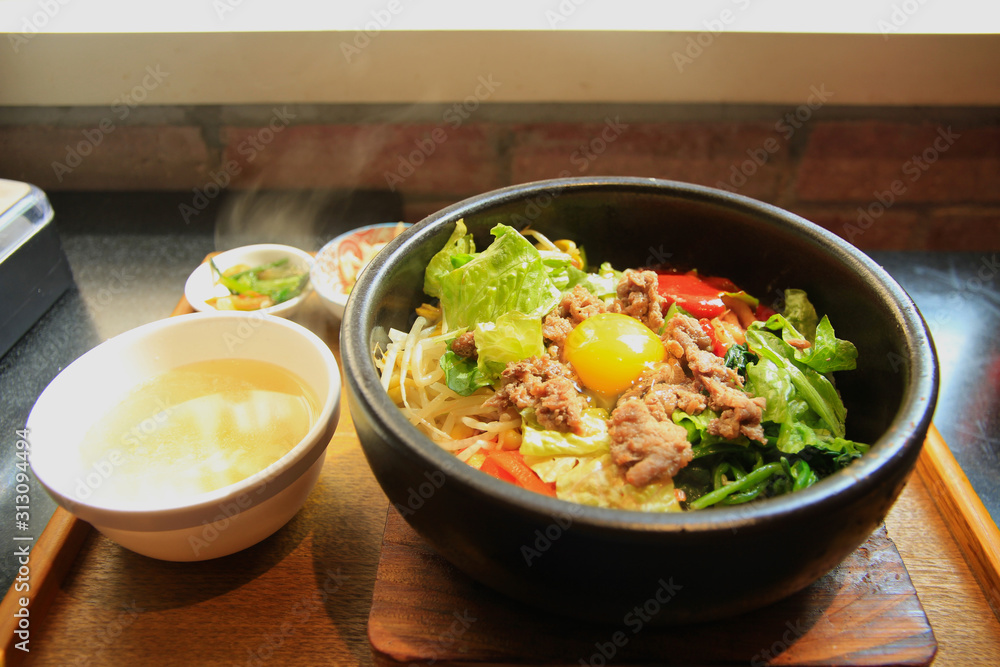 Sizzling Hot Korean Hot Stone Pot Bibimbap with Side Dishes