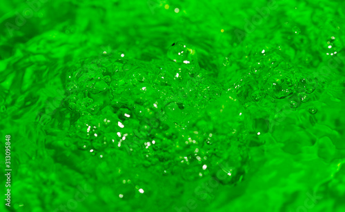 water splash on green background