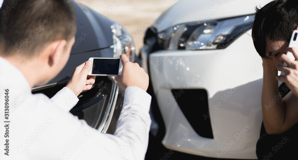 Insurance agents inspect for damage to cars that collide on the road to claim compensation from driving accidents, Insurance concept. Insurance agents inspect for damage to cars that collide on the road to claim compensation from driving accidents, Insurance concept.