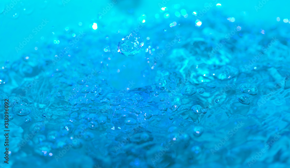 water splash on a blue background water splash on a blue background