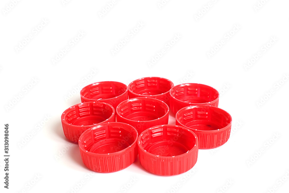 red plastic bottle caps isolated on white background. red plastic bottle caps isolated on white background.