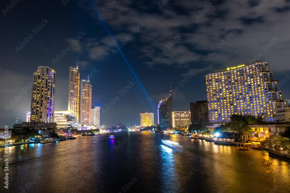 Fototapeta premium City view by the river Bright night The beauty of the capital