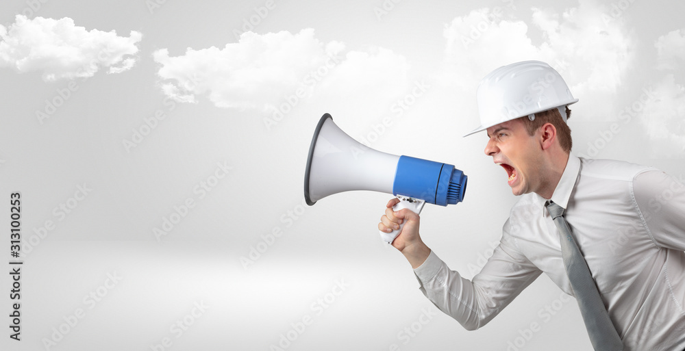 Fototapeta premium Young supervisor architect yelling to far big city panorama