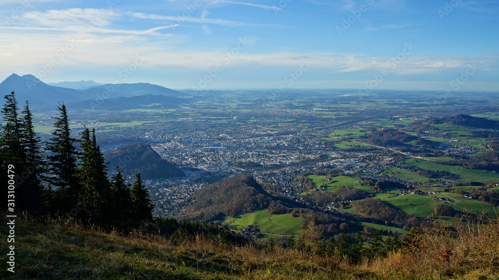 Aerial panorama of Salzburg from the top of Untersberg mountain in Austria.