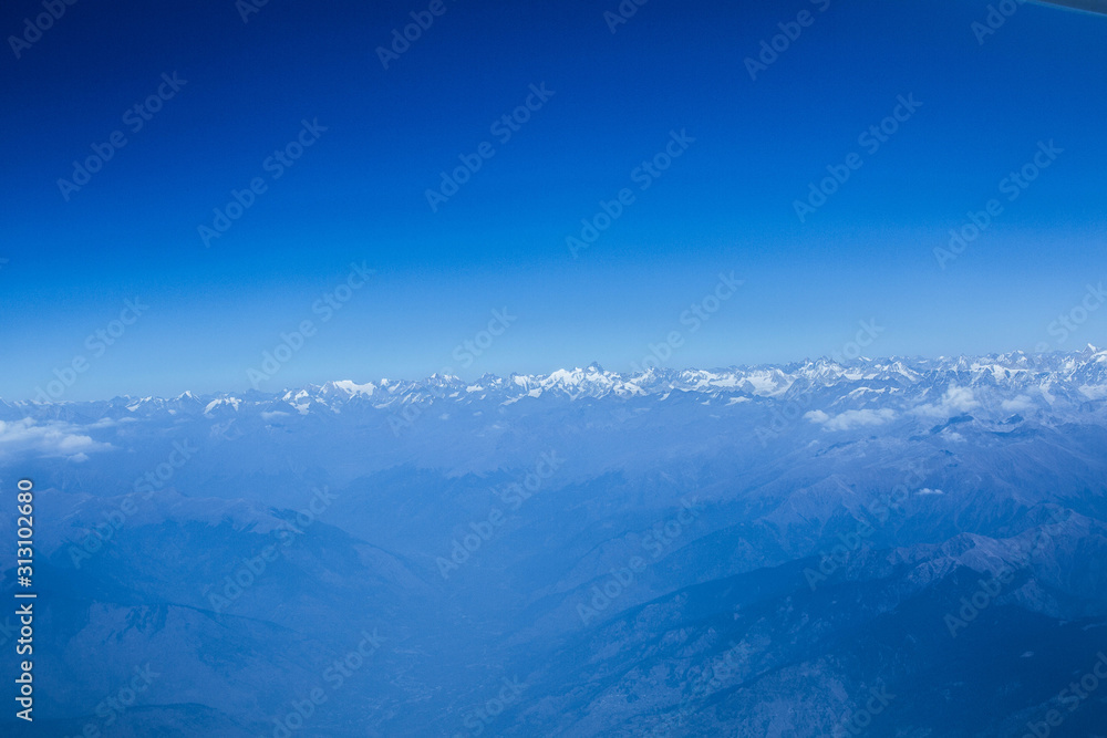 Above the clouds in Himalayas mountain range, Nepal