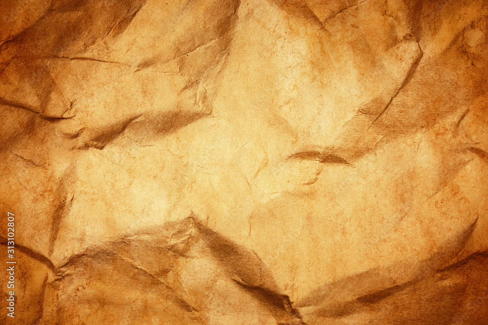 Grunge brown crumpled paper texture. Stained dirty and burned message background for graphic design. Grunge brown crumpled paper texture. Stained dirty and burned message background for graphic design.