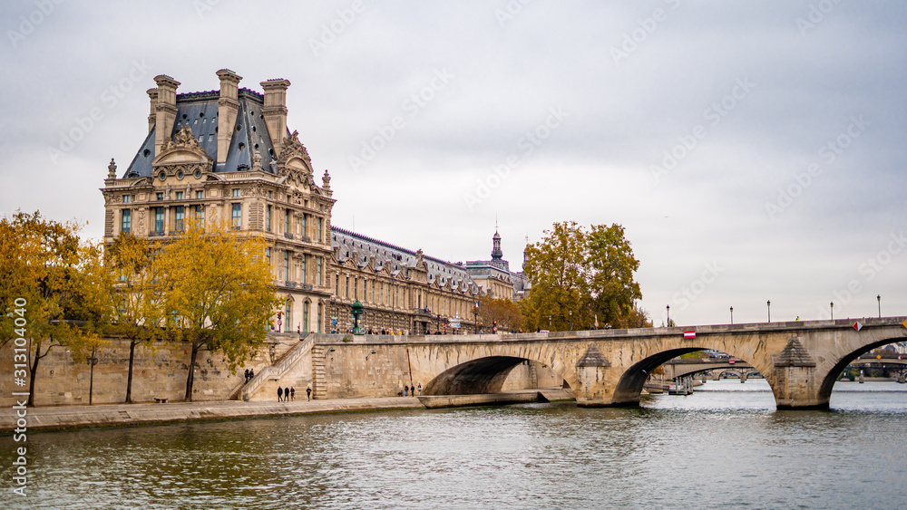 Nice view from Paris Seien river cruise tour during Autumn season evening . One of the most famous activities which locate in the heart of Paris , France