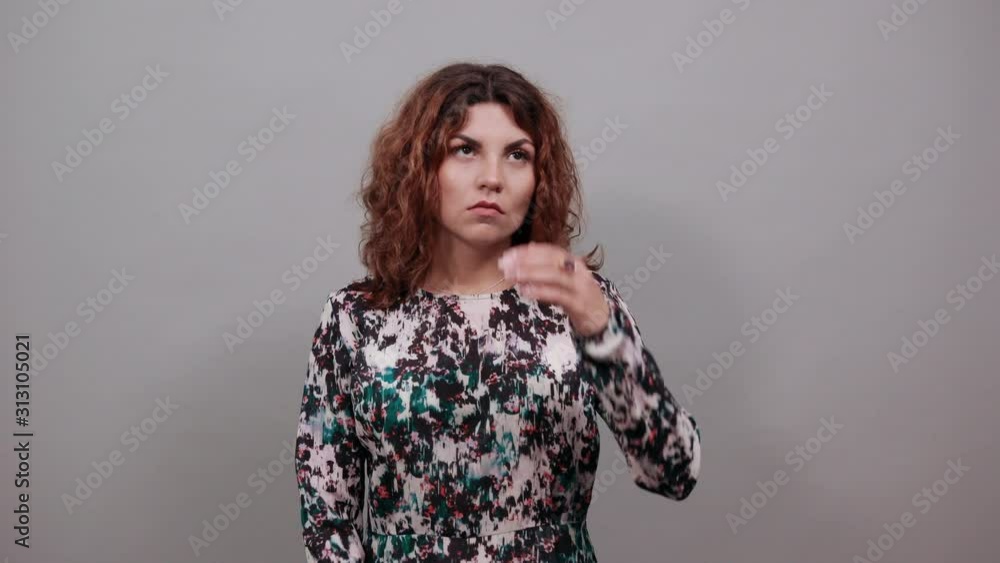 Sickness young woman over isolated gray background in fashion shirt keeping hand on head, having headache, nice ring. People emotions. Lifestyle concept Sickness young woman over isolated gray background in fashion shirt keeping hand on head, having headache, nice ring. People emotions. Lifestyle concept