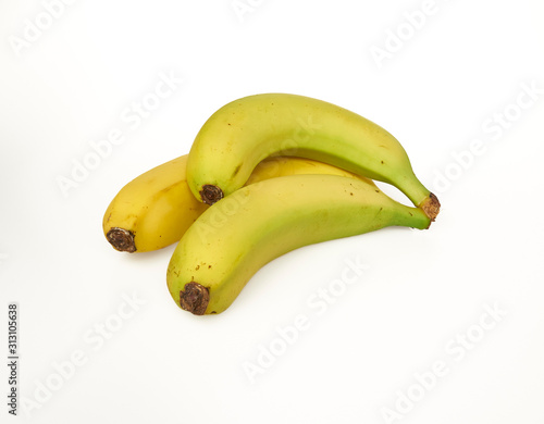 three bananas on a white background