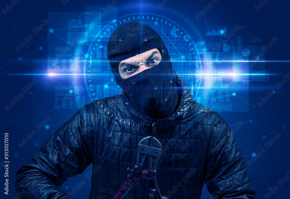 Facial recognition system. Young man on blue background Facial recognition system. Young man on blue background