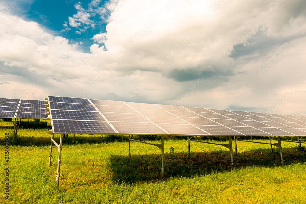 Photovoltaic panels on a green field Photovoltaic panels on a green field