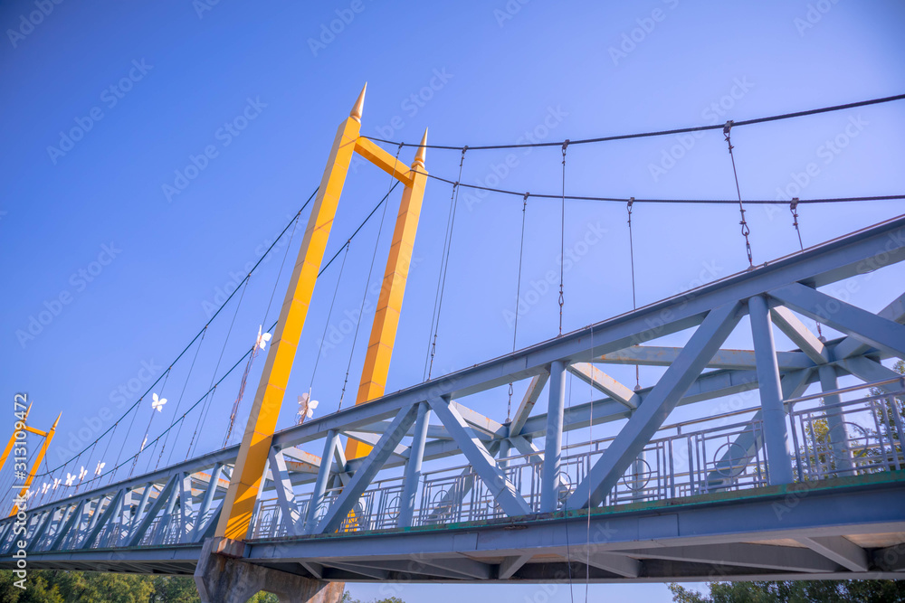 Blue iron bridge and sky