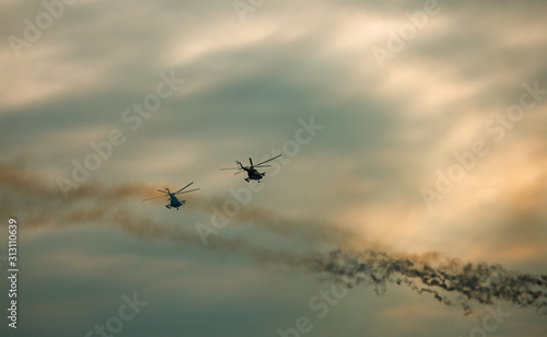 Military helicopter fired anti-armor missiles at sunset