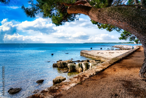 The beach of Porec on a beautiful summer day