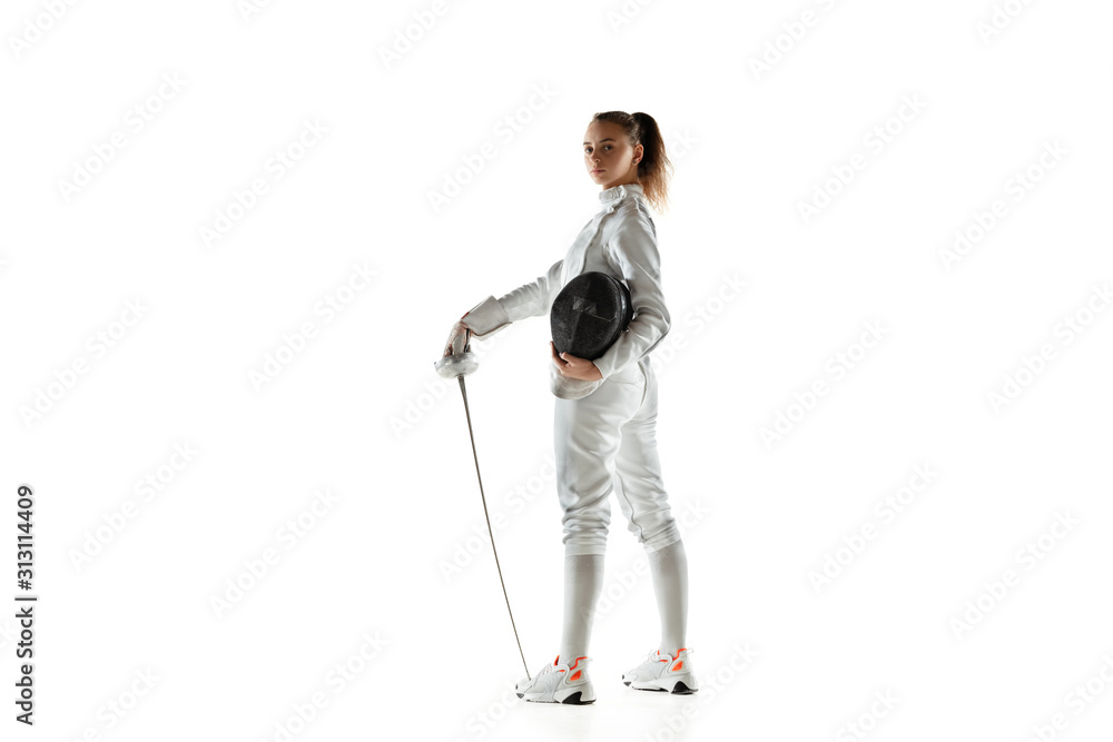 Champion. Teen girl in fencing costume with sword in hand isolated on white background. Young female model practicing and training in motion, action. Copyspace. Sport, youth, healthy lifestyle. Champion. Teen girl in fencing costume with sword in hand isolated on white background. Young female model practicing and training in motion, action. Copyspace. Sport, youth, healthy lifestyle.