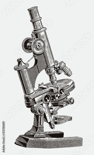 Large inclinable optical microscope with hinged joint and clamping lever. Illustration after antique engraving from 19th century