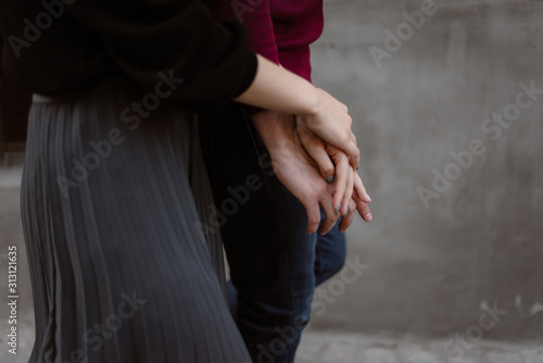 couple honding hands