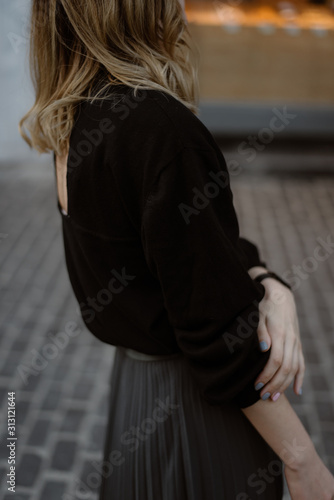young woman in black jumper