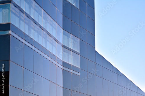 The windows of a modern building for offices. Business buildings architecture.