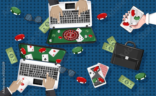 People playing casino on laptop and mobile phone
