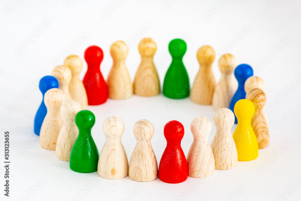 Playful Concepts: group of game figurines in a circle standing for the concepts unity, integration, diversity, cooperation Playful Concepts: group of game figurines in a circle standing for the concepts unity, integration, diversity, cooperation