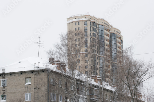 Snow covered roof of a city house