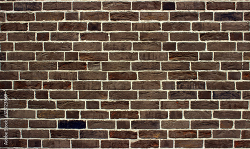Taupe brick wall. Wallpaper in retro style.