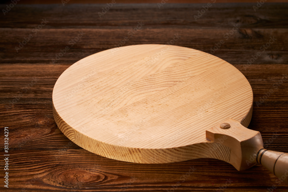 Background with cutting board on wooden table Space of wooden top Wooden background with wooden table and round cutting board Background with cutting board on wooden table Space of wooden top Wooden background with wooden table and round cutting board